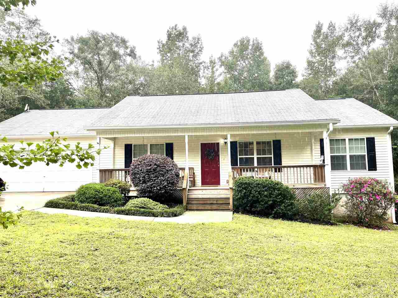 382 Martin Dairy Road Milner, GA 30257 - Photo 1 of 1 a front view of a house with garden