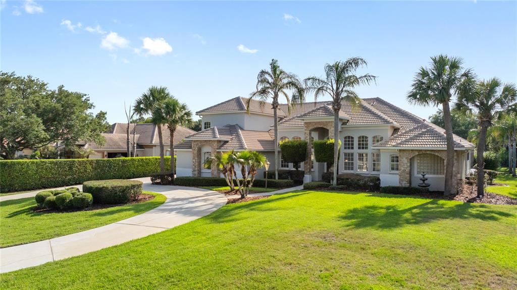 2002 Water Key Drive Windermere, FL 34786 - Photo 60 of 60 a view of a house with a yard patio and swimming pool