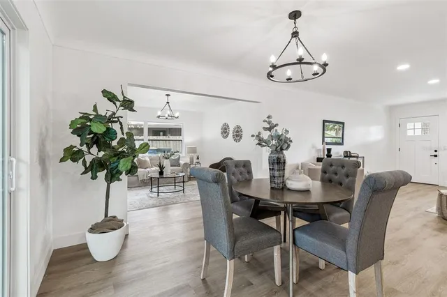 a bathroom with a double vanity sink and mirror