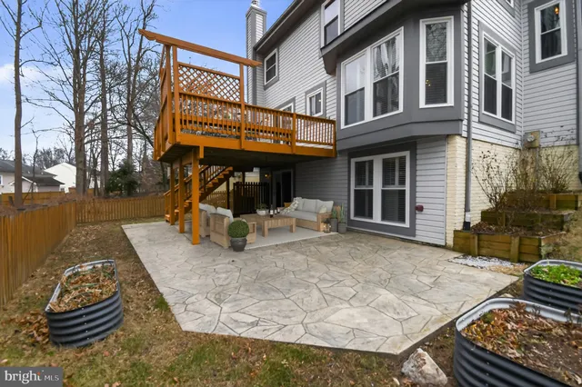 a picture of a bench in front of a wall