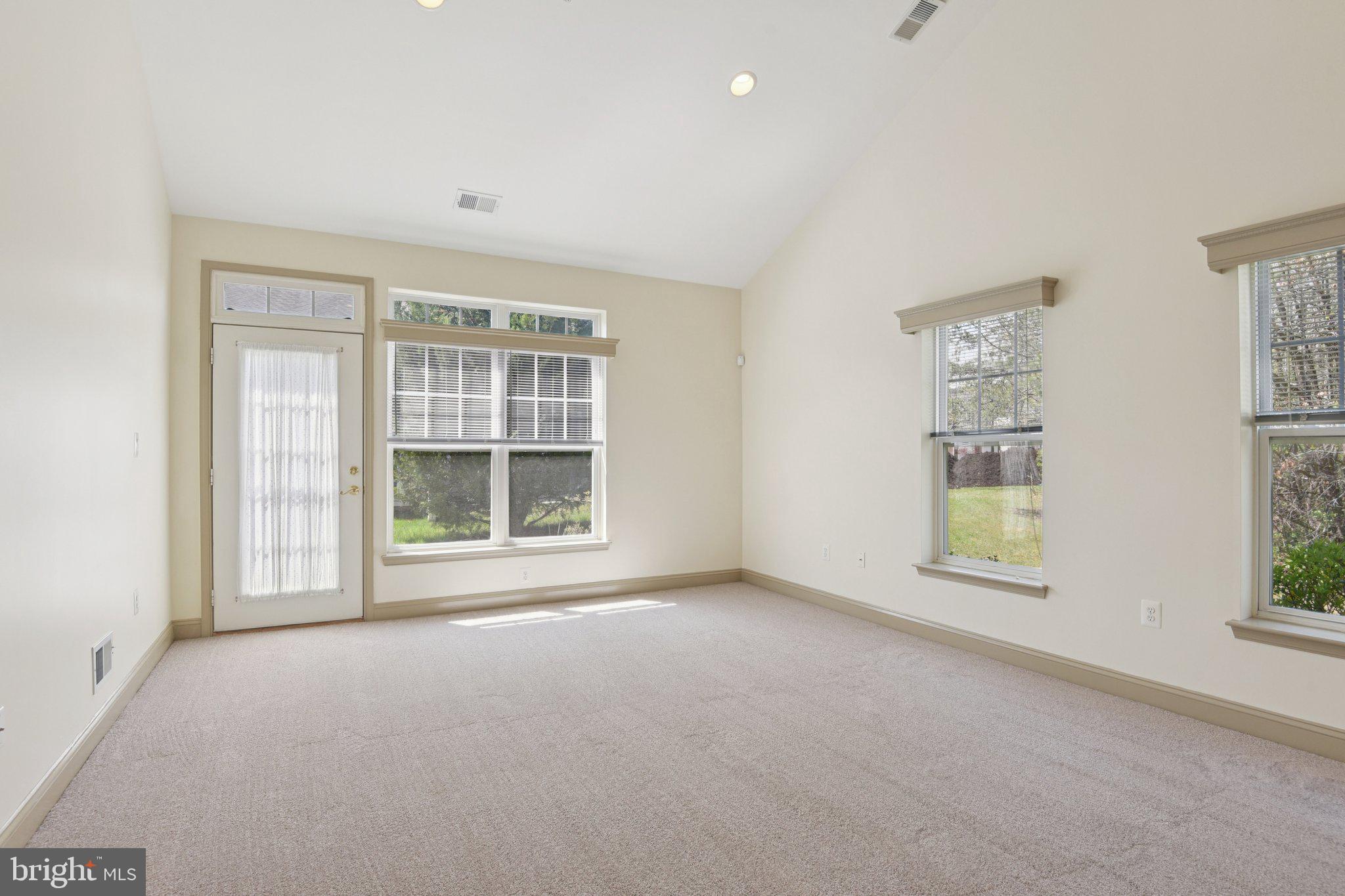 7201 Paperbark Terrace Laurel, MD 20707 - Photo 12 of 58 great room, door to rear patio