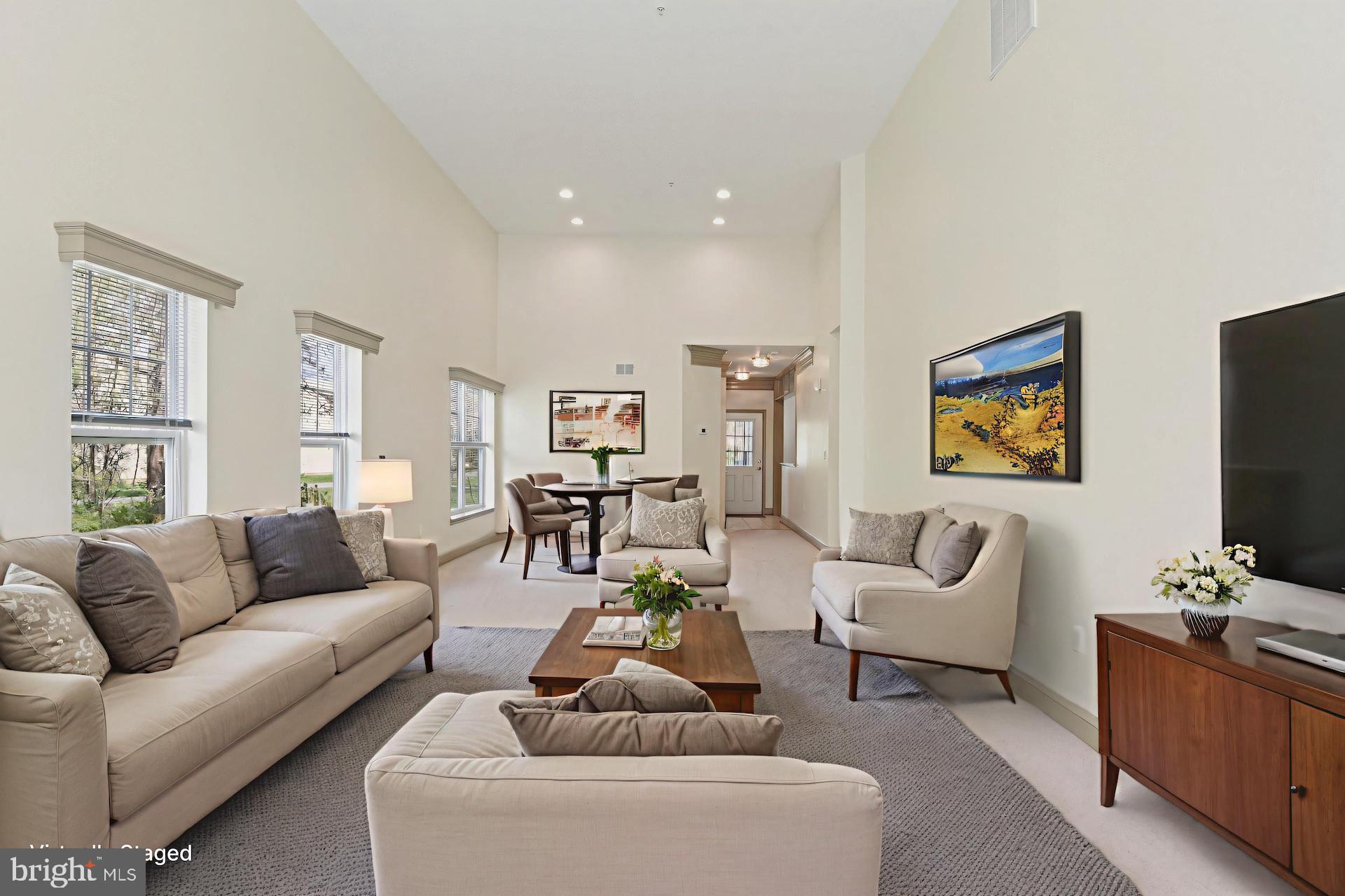 7201 Paperbark Terrace Laurel, MD 20707 - Photo 16 of 58 great room, living to dining staged