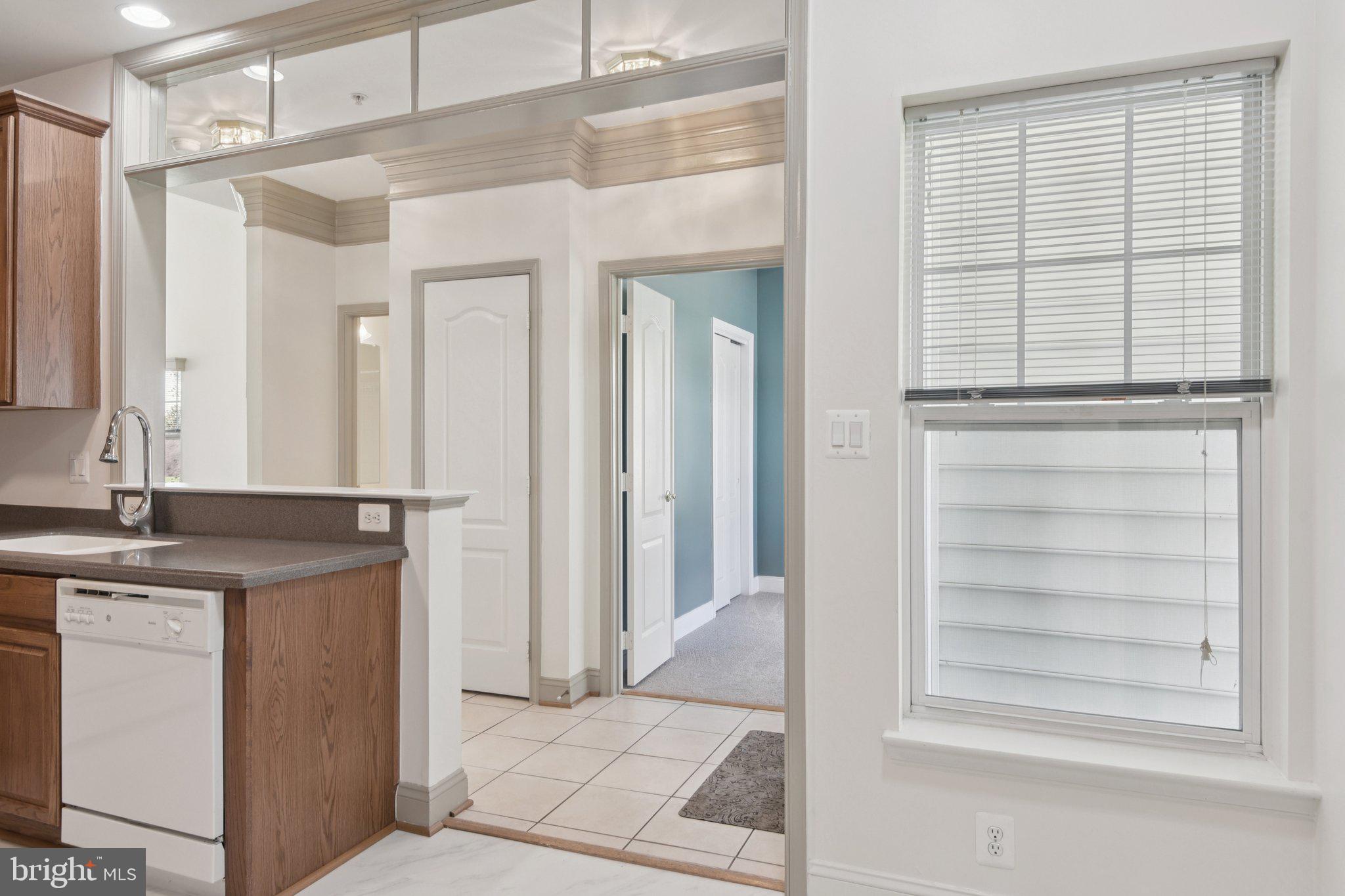 7201 Paperbark Terrace Laurel, MD 20707 - Photo 9 of 58 entry/kitchen/door to bedroom 2