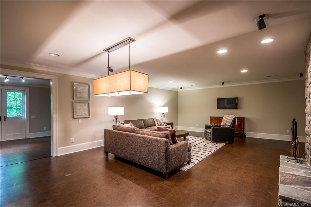 2141 Sagamore Road Charlotte, NC 28209 - Photo 12 of 24 a living room with furniture window and wooden floor