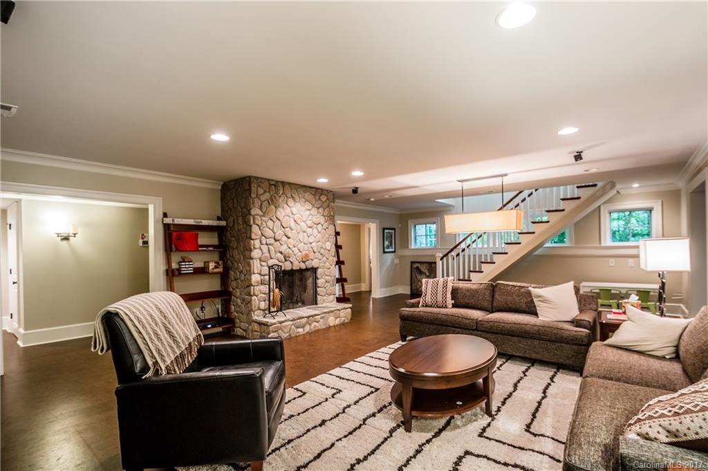 2141 Sagamore Road Charlotte, NC 28209 - Photo 15 of 24 a living room with furniture and a wooden floor