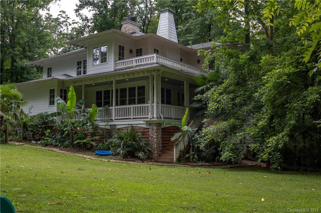 2141 Sagamore Road Charlotte, NC 28209 - Photo 21 of 24 a front view of a house with a garden