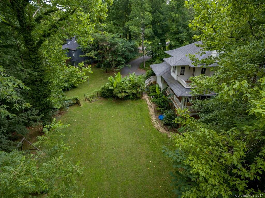 2141 Sagamore Road Charlotte, NC 28209 - Photo 23 of 24 an aerial view of a house with swimming pool and garden