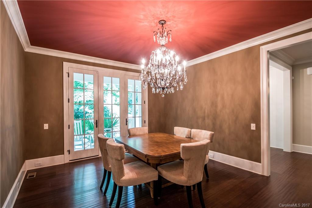 2141 Sagamore Road Charlotte, NC 28209 - Photo 5 of 24 a view of a dining room with furniture window and wooden floor