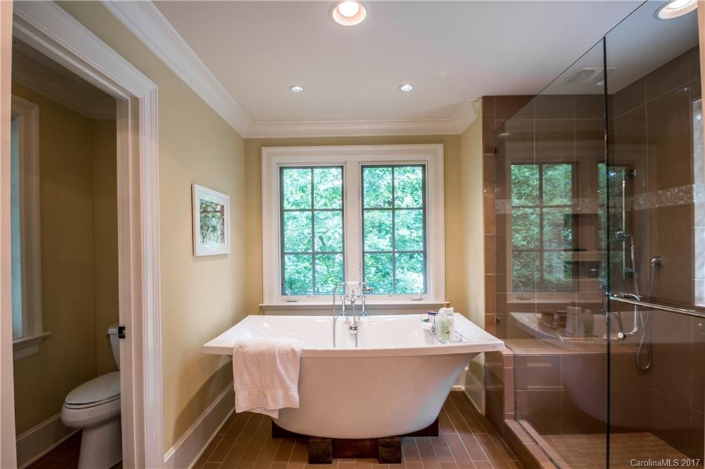 2141 Sagamore Road Charlotte, NC 28209 - Photo 7 of 24 a bathroom with a bathtub and shower