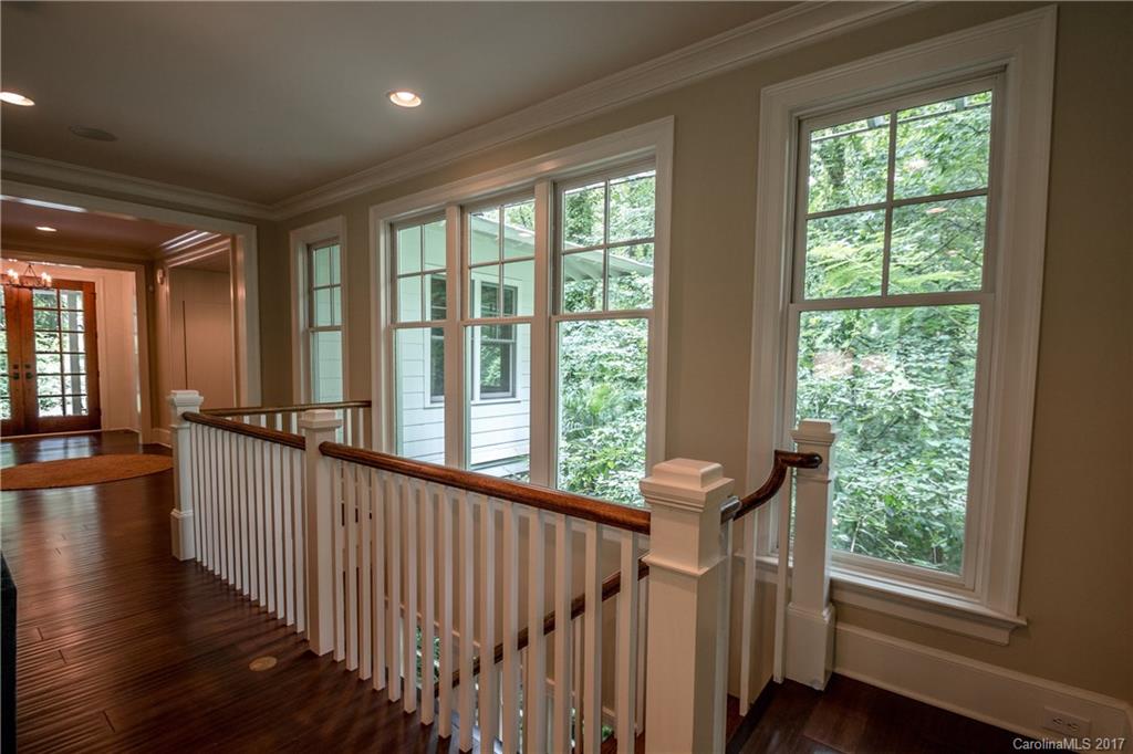 2141 Sagamore Road Charlotte, NC 28209 - Photo 8 of 24 a view of a room with wooden floor and a window