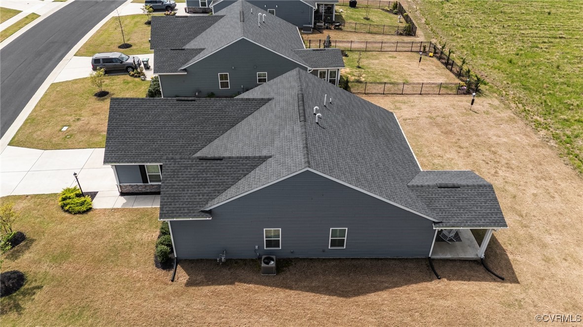 8106 West Danube Loop New Kent, VA 23124 - Photo 40 of 48 an aerial view of a house with swimming pool