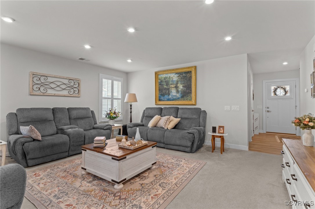 8106 West Danube Loop New Kent, VA 23124 - Photo 8 of 48 a living room with furniture and a rug