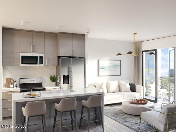 1302 Magnolia Street, Unit B103 Gulfport, MS 39507 - Photo 4 of 15 IMG_1808