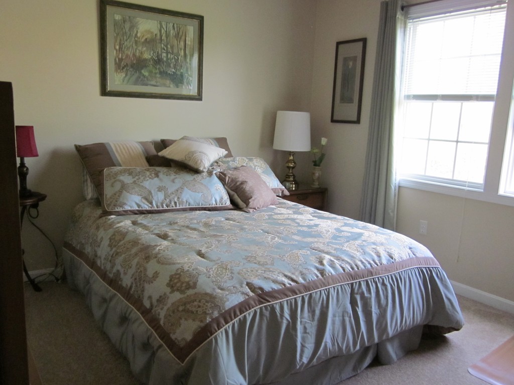 5 Woodland Road Springfield, MA 01129 - Photo 15 of 30 a bedroom with a bed and window