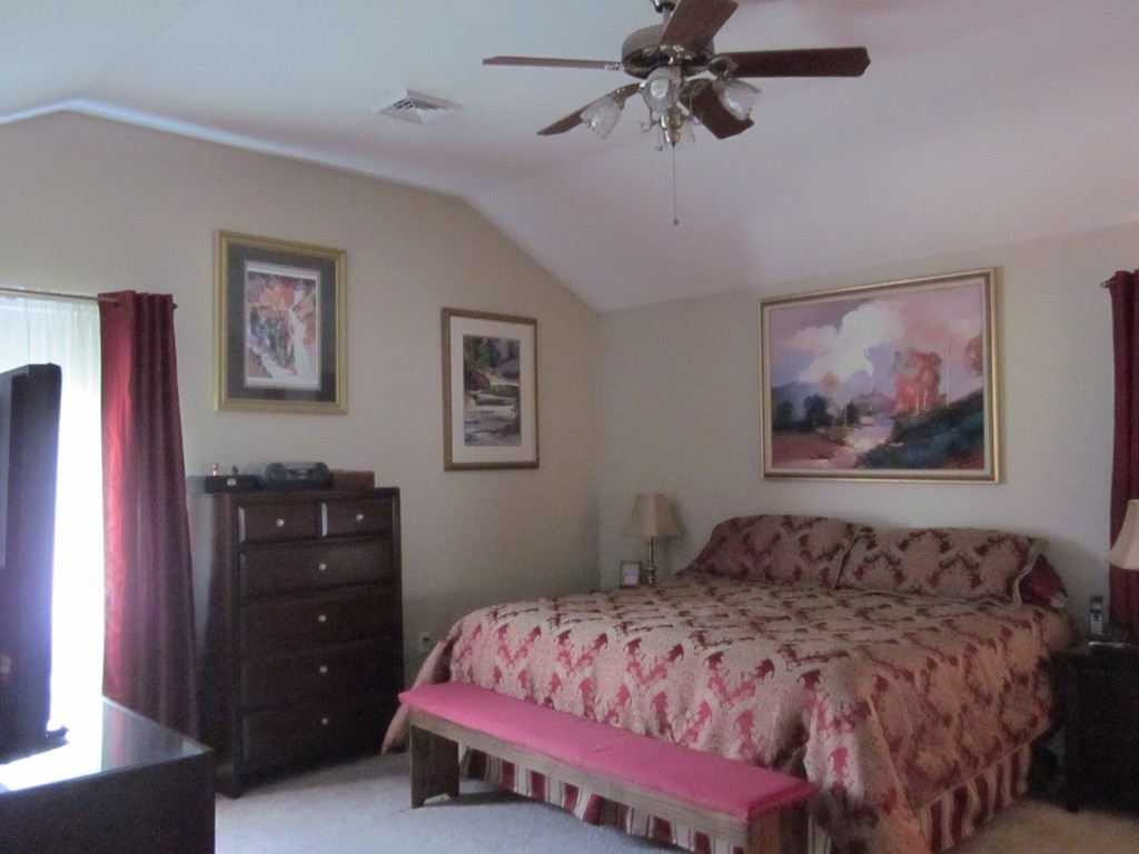 5 Woodland Road Springfield, MA 01129 - Photo 20 of 30 a bedroom with a bed and dresser