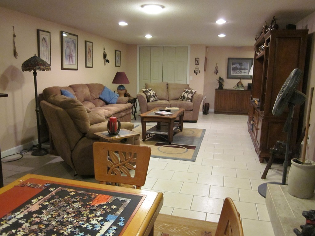 5 Woodland Road Springfield, MA 01129 - Photo 23 of 30 a living room with furniture and a rug