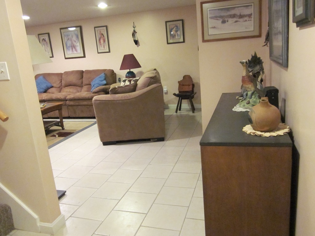 5 Woodland Road Springfield, MA 01129 - Photo 24 of 30 a living room with furniture and wall painting