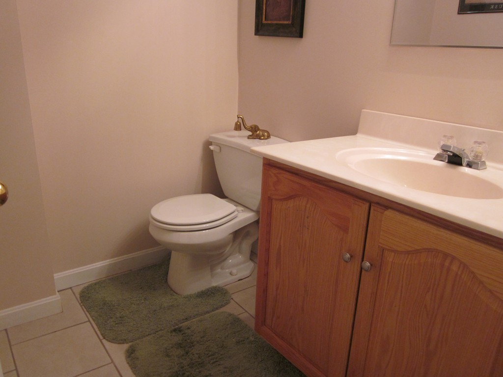 5 Woodland Road Springfield, MA 01129 - Photo 26 of 30 a bathroom with a sink toilet and a mirror