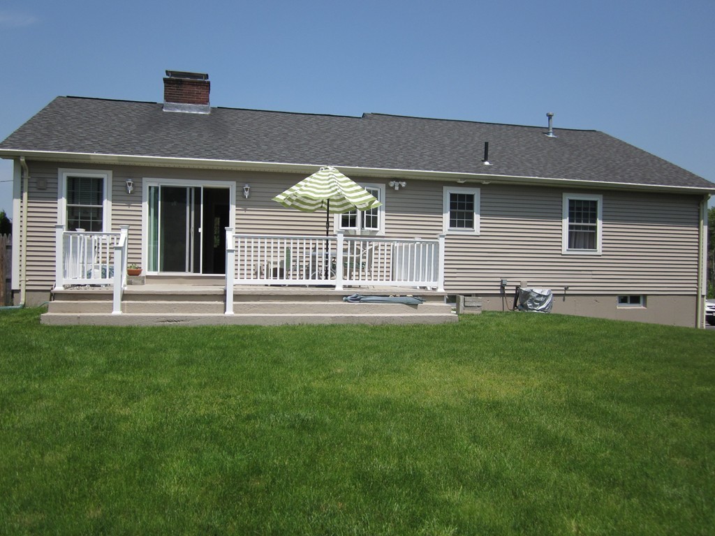 5 Woodland Road Springfield, MA 01129 - Photo 29 of 30 a front view of a house with a yard