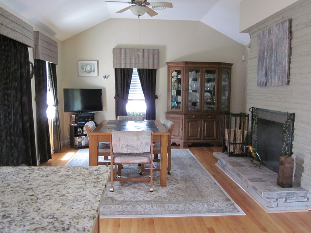 5 Woodland Road Springfield, MA 01129 - Photo 7 of 30 a dining room with furniture and a fireplace