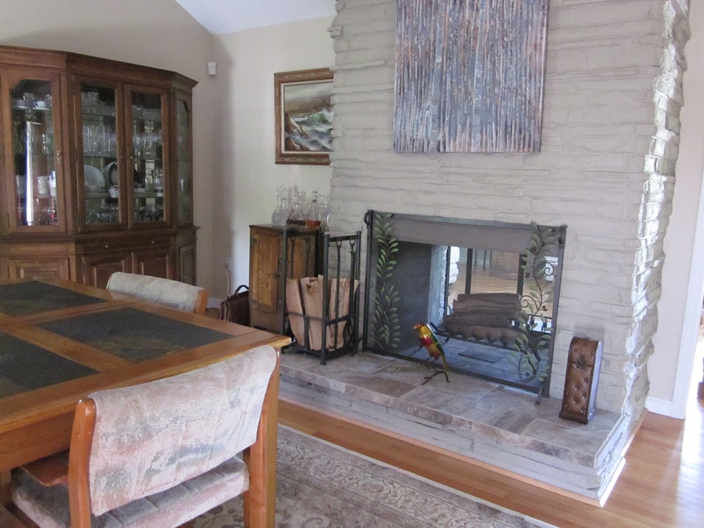 5 Woodland Road Springfield, MA 01129 - Photo 9 of 30 a living room with furniture and a fireplace