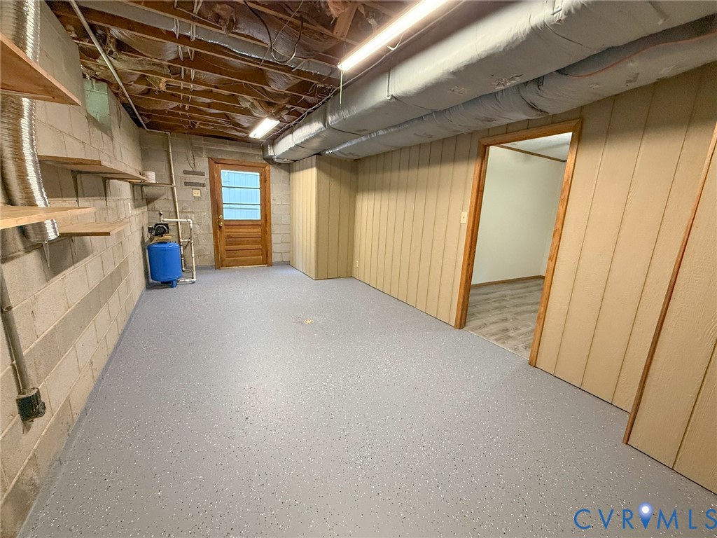 2829 Winningham Road Crewe, VA 23930 - Photo 21 of 46 Utility room featuring light gray speckled floorin