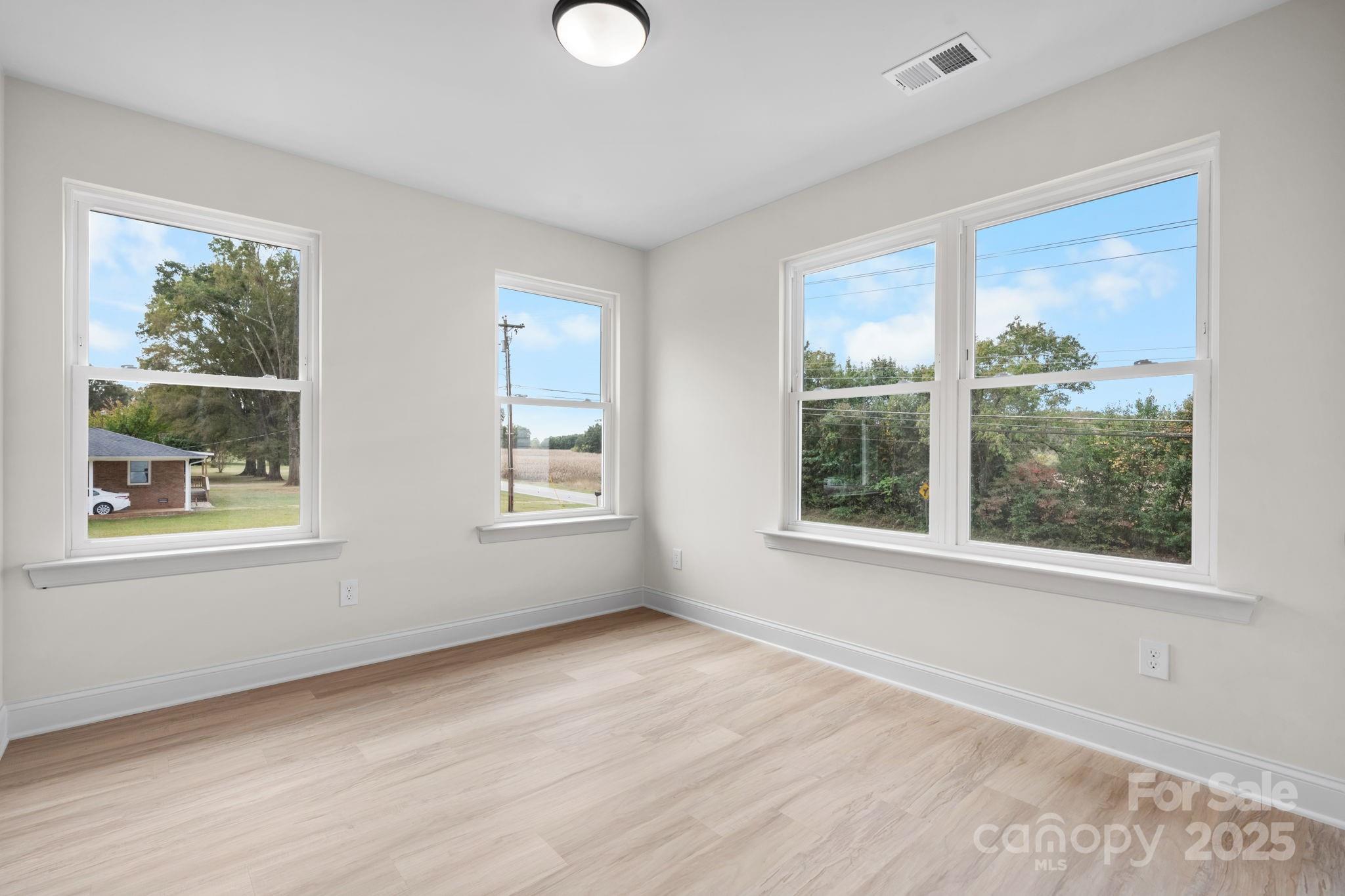 1888 Sigmon Dairy Road Newton, NC 28658 - Photo 17 of 38 a view of an empty room with a window