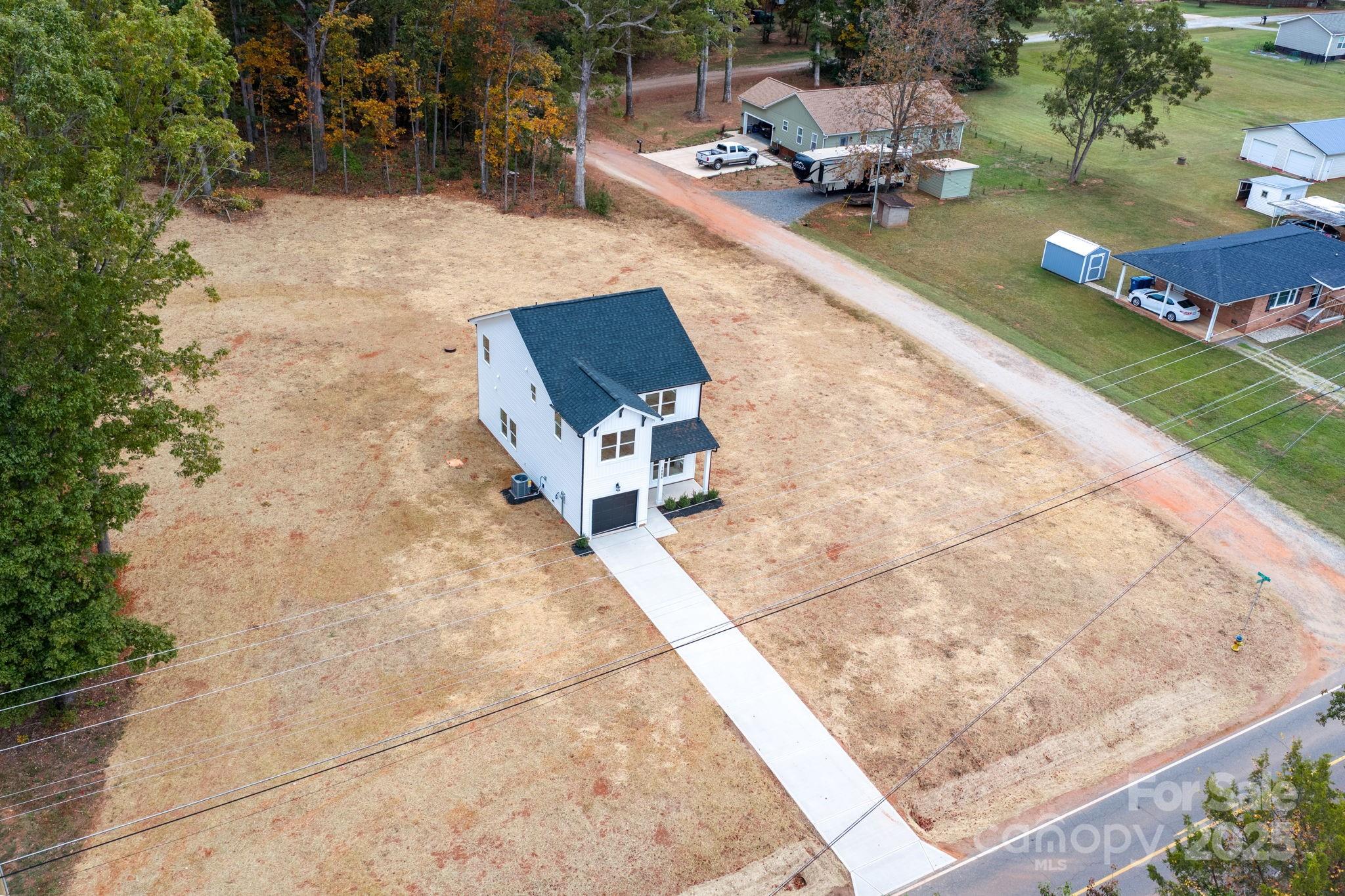 1888 Sigmon Dairy Road Newton, NC 28658 - Photo 21 of 38 a view of a backyard with sitting area