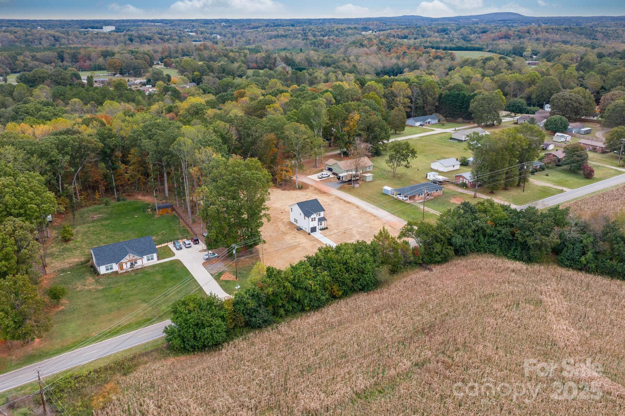 1888 Sigmon Dairy Road Newton, NC 28658 - Photo 22 of 38 an aerial view of a house with a yard