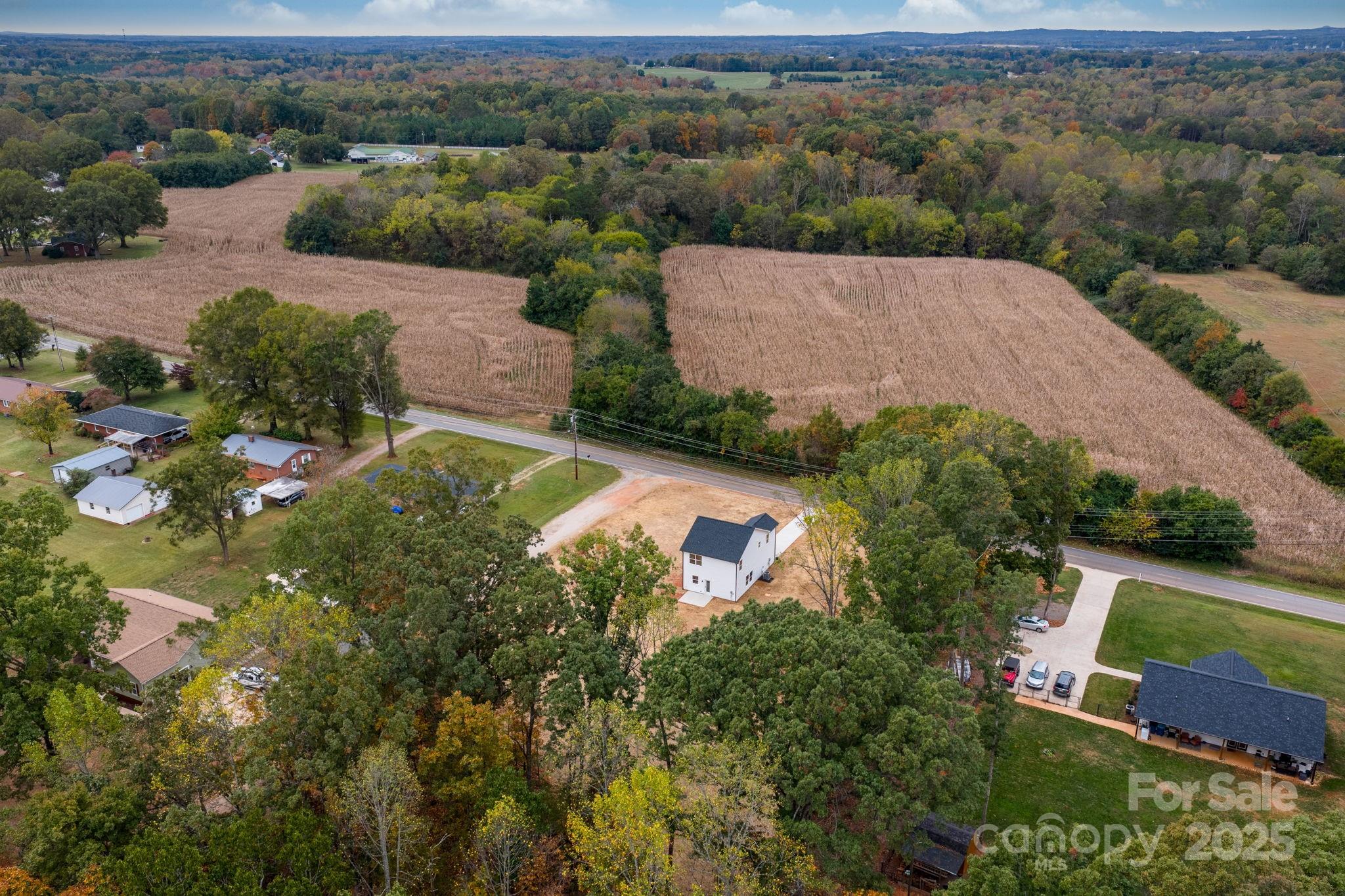 1888 Sigmon Dairy Road Newton, NC 28658 - Photo 23 of 38 an aerial view of a house with a garden