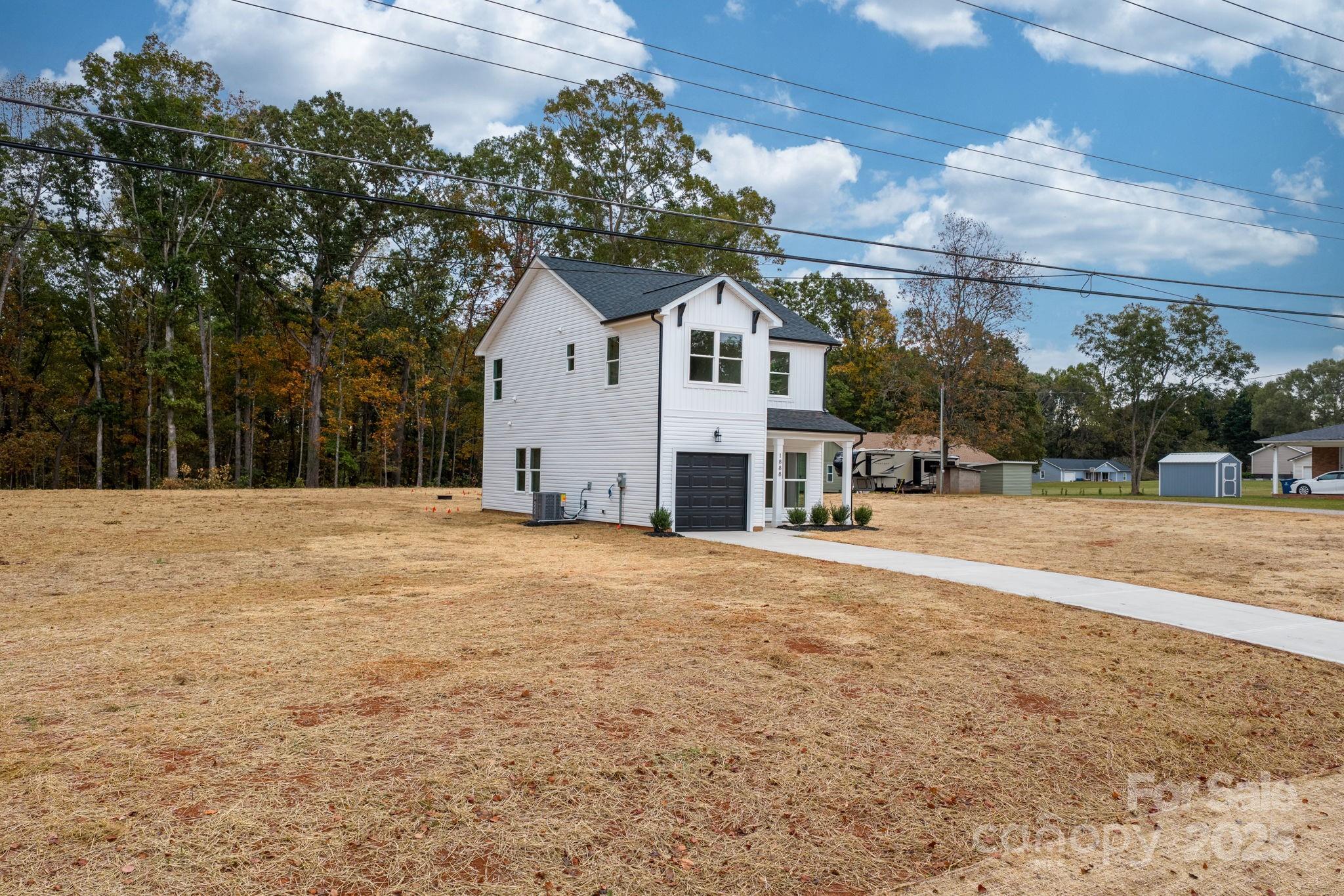 1888 Sigmon Dairy Road Newton, NC 28658 - Photo 31 of 38 a view of house with a yard