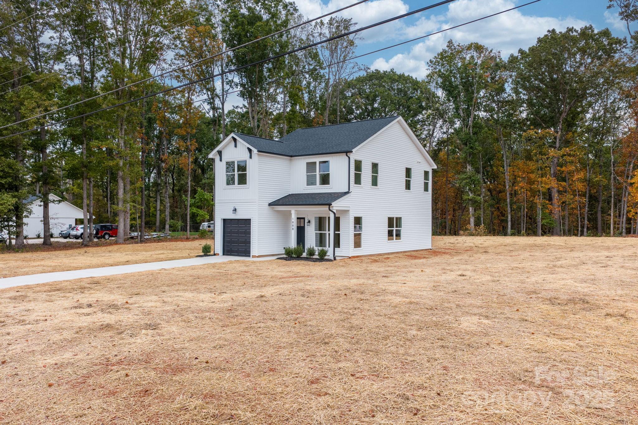 1888 Sigmon Dairy Road Newton, NC 28658 - Photo 33 of 38 a view of a house with a outdoor space