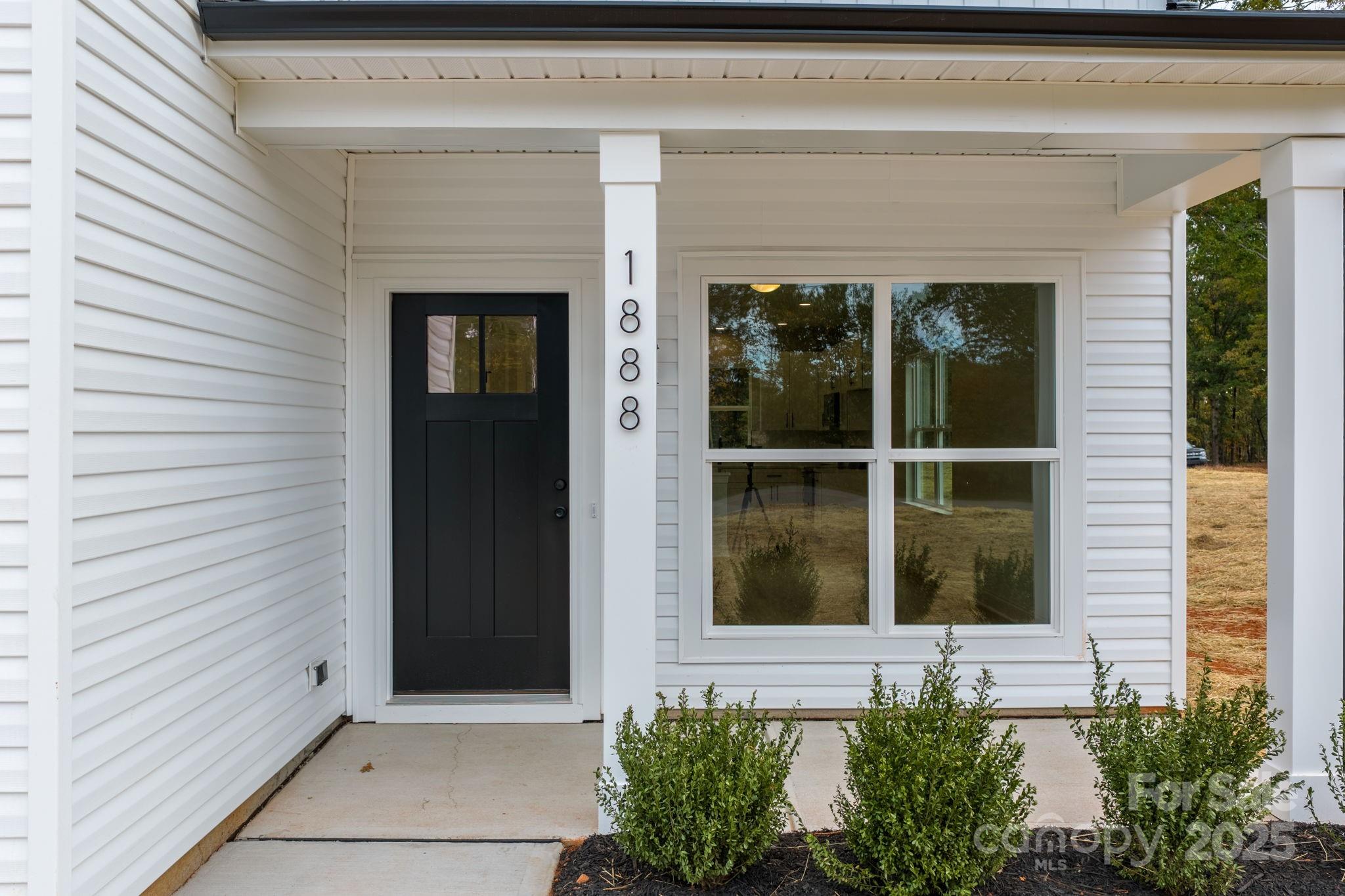 1888 Sigmon Dairy Road Newton, NC 28658 - Photo 35 of 38 a view of front door of house and window