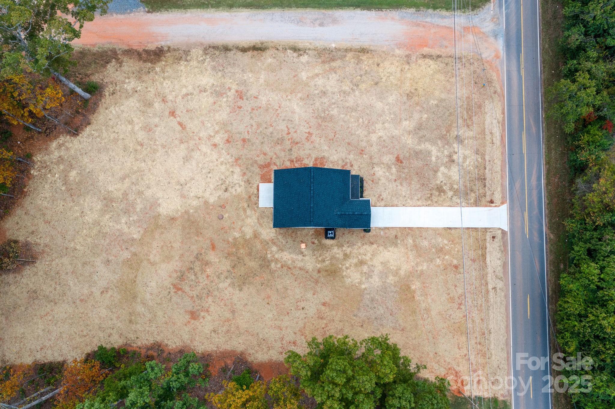 1888 Sigmon Dairy Road Newton, NC 28658 - Photo 37 of 38 view of a dry yard with wooden fence