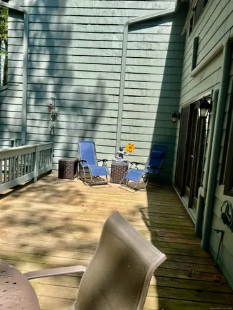 a view of balcony with two chairs