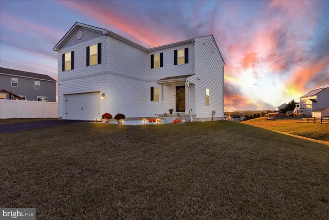 a front view of house with yard