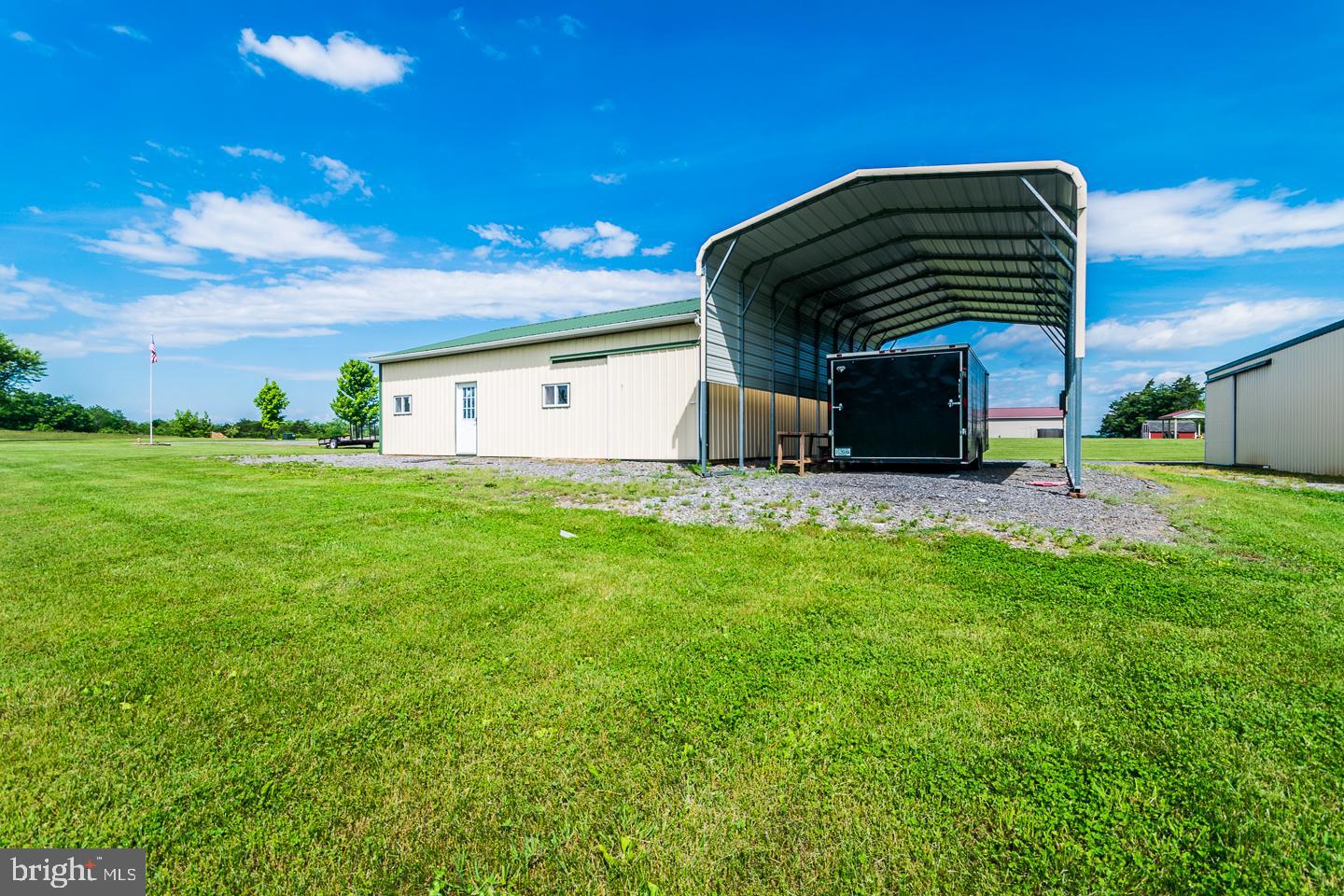72 Hinton Ridge Lane Kearneysville, WV 25430 - Photo 36 of 40 RV carport 18 x40 with 12 ft side Walls