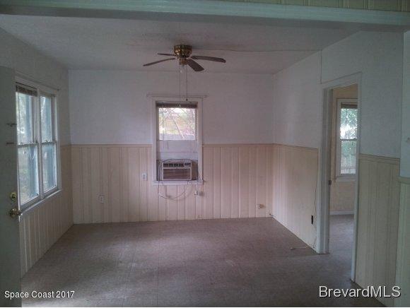 1220 Fern Street Cocoa, FL 32922 - Photo 4 of 4 a view of empty room with windows