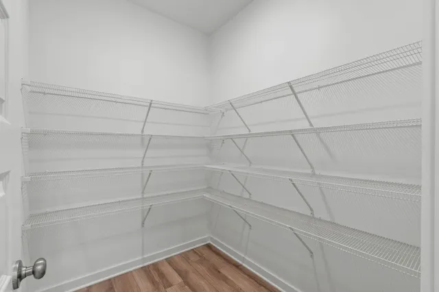 a view of a room with racks on the wall