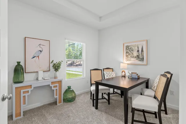 a room with furniture and a window