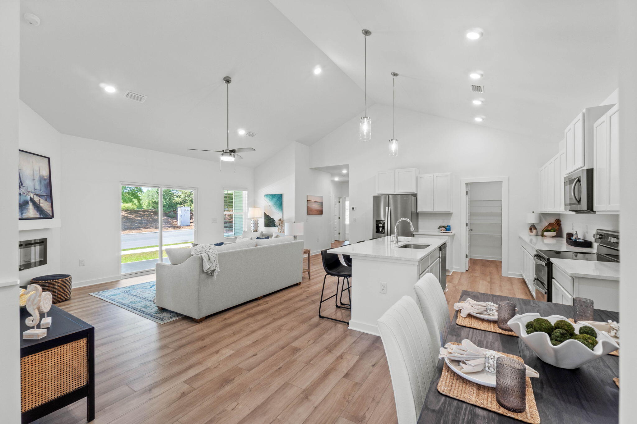 165 Sweetclover Street Freeport, FL 32439 - Photo 3 of 34 a living room with furniture and a large window