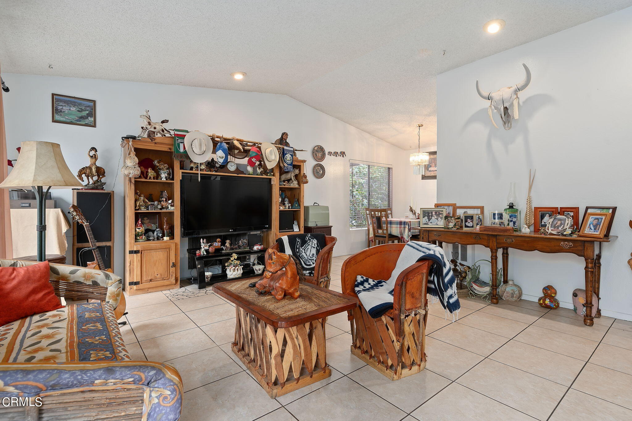 5124 Jefferson Square Oxnard, CA 93033 - Photo 4 of 12 a living room with lots of furniture and a flat screen tv