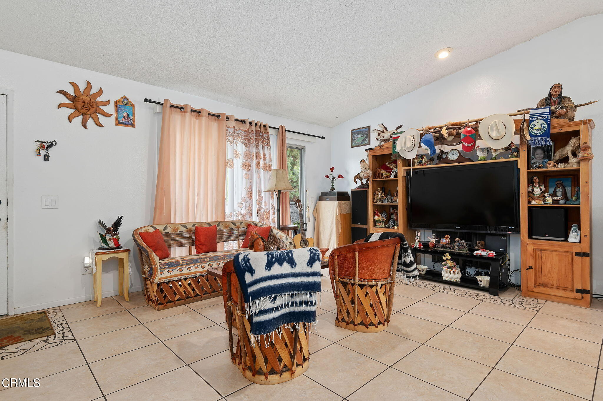 5124 Jefferson Square Oxnard, CA 93033 - Photo 5 of 12 a living room with furniture and a flat screen tv