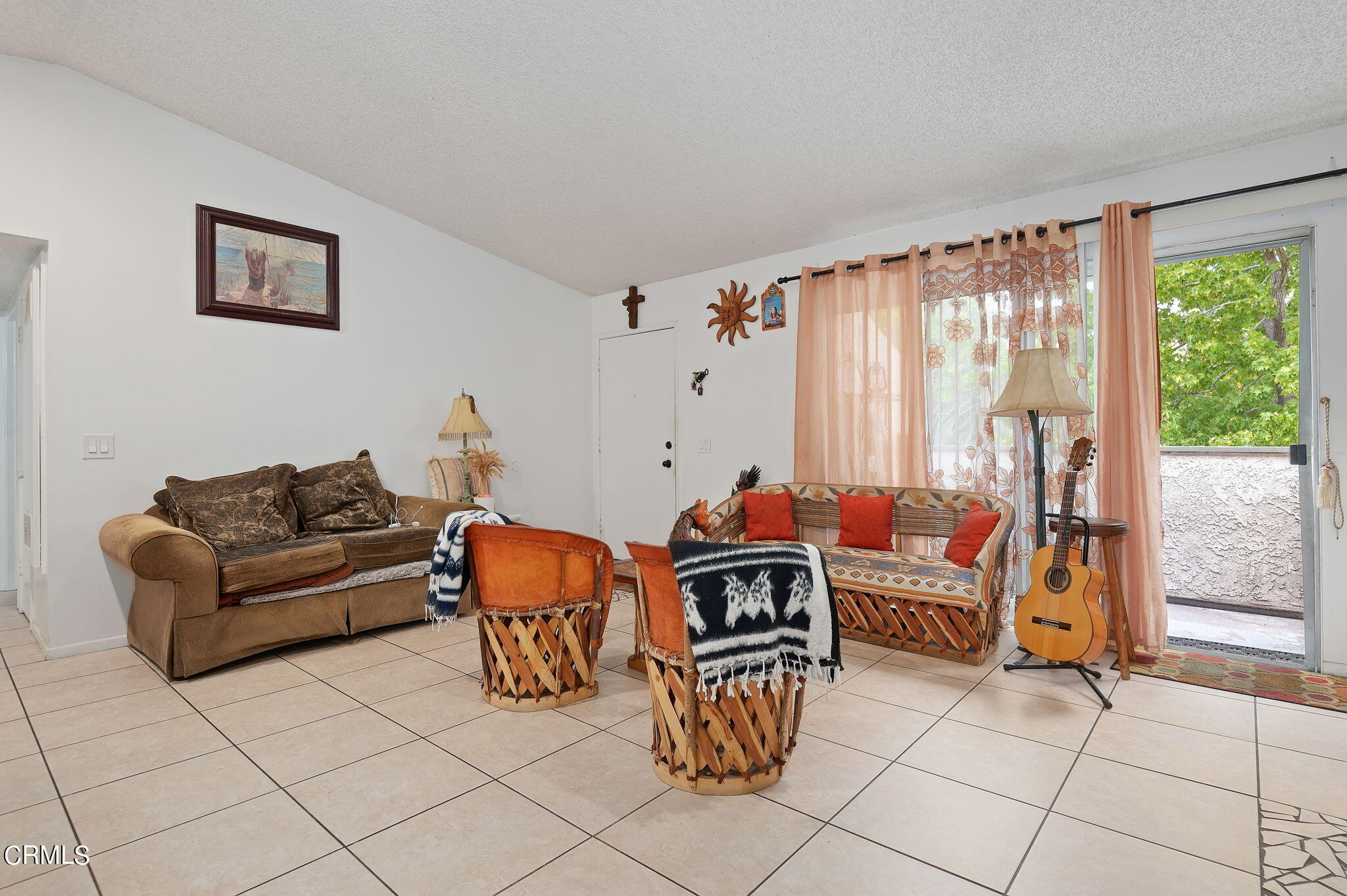 5124 Jefferson Square Oxnard, CA 93033 - Photo 6 of 12 a living room with furniture and a floor to ceiling window