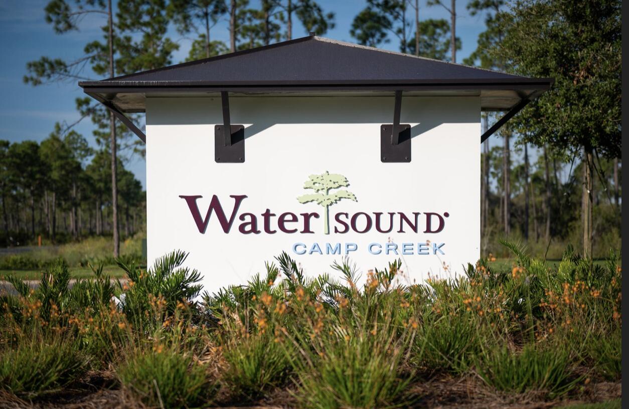 Lot 129 Watersound Camp Crk Inlet Beach Inlet Beach, FL 32461 - Photo 1 of 1 a sign that is on the side of the building