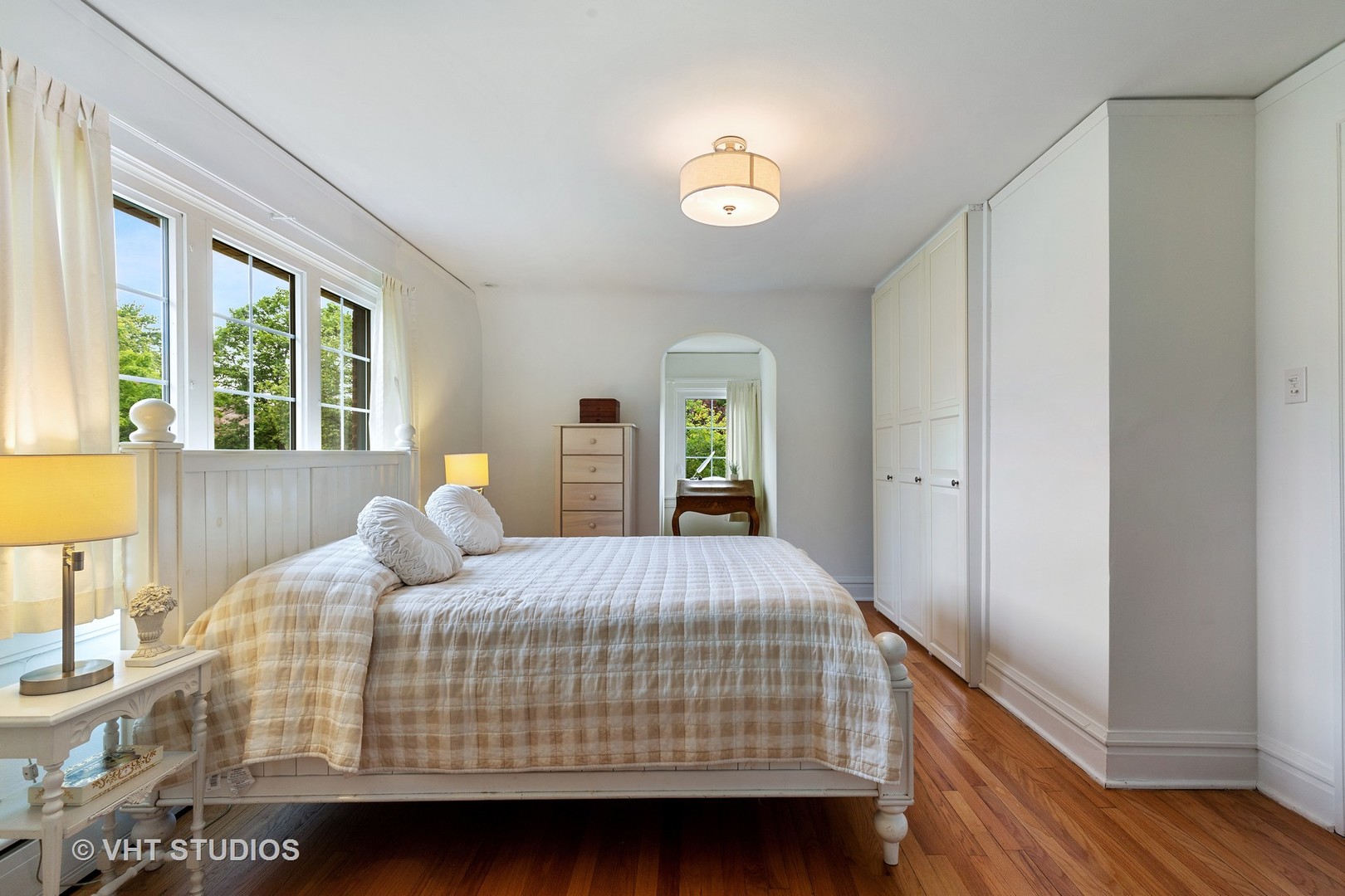 255 Addison Road Riverside, IL 60546 - Photo 13 of 24 a bedroom with a bed and wooden floor