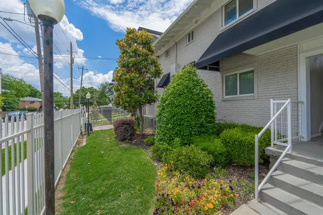 a aerial view of a house with a yard