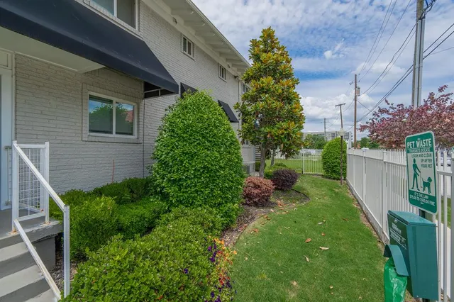 aerial view of residential houses with city view