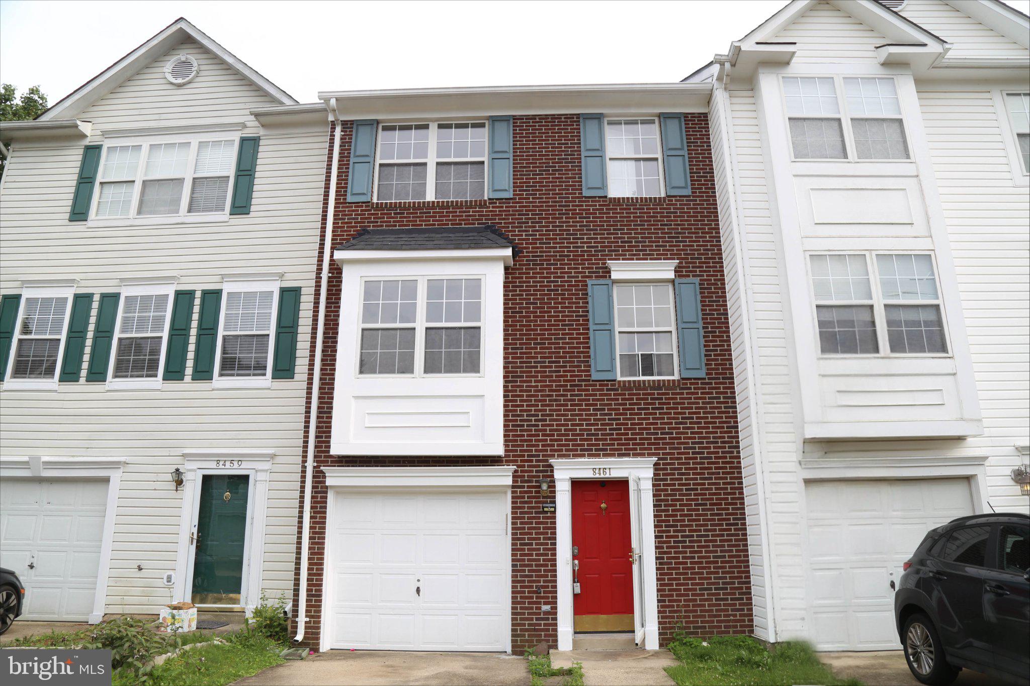 Charming townhouse with vibrant accents.