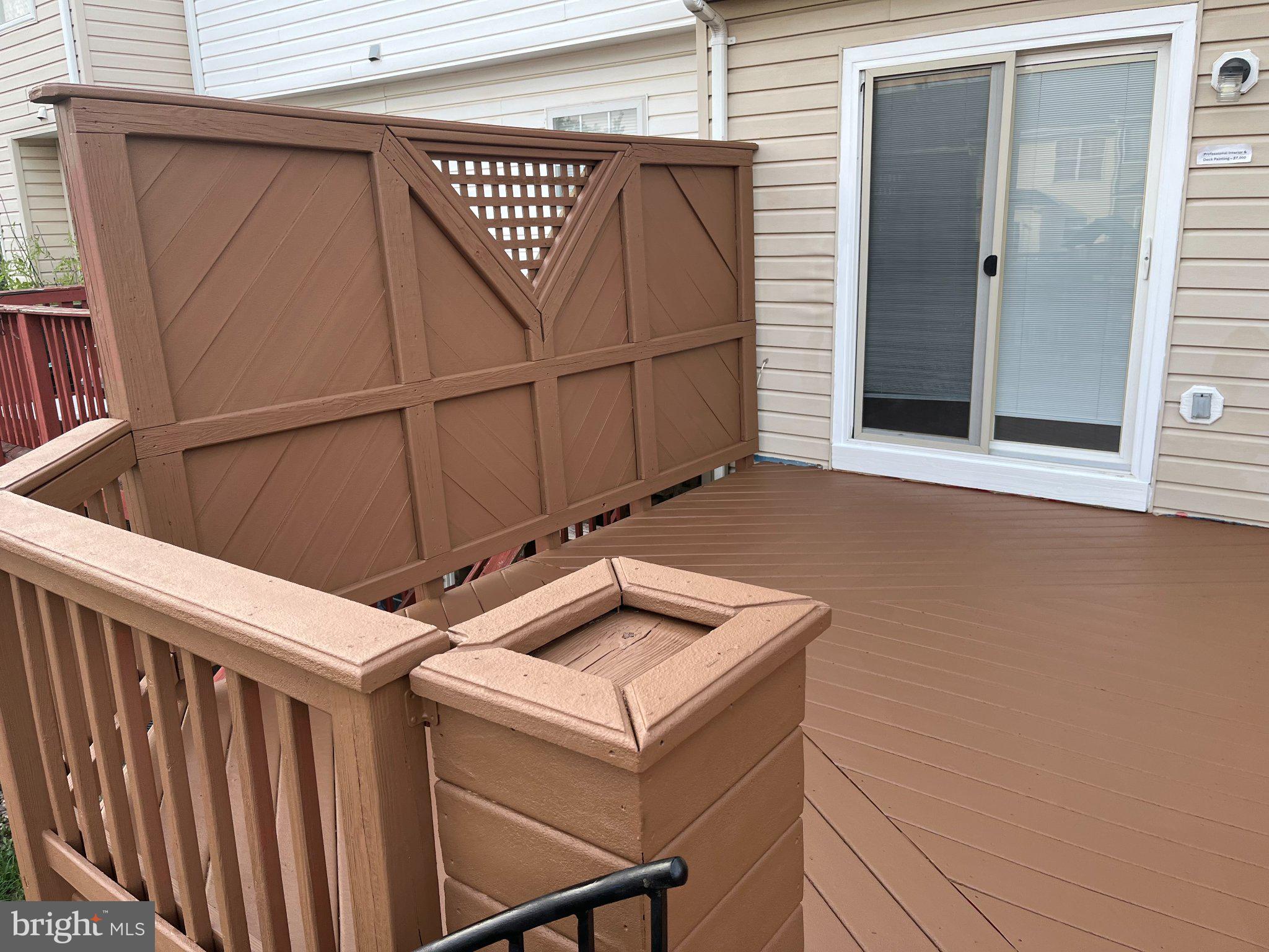 8461 Tackhouse Loop Gainesville, VA 20155 - Photo 9 of 10 a view of a balcony with furniture